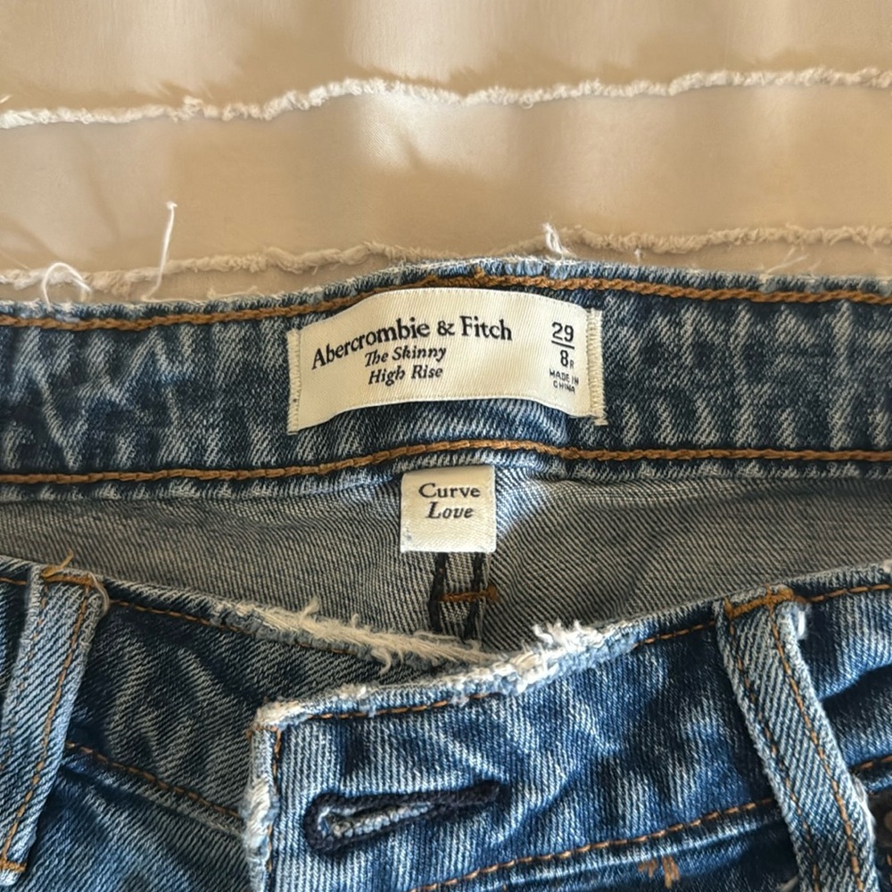 29 curve love jeans. Distressed at the ankles